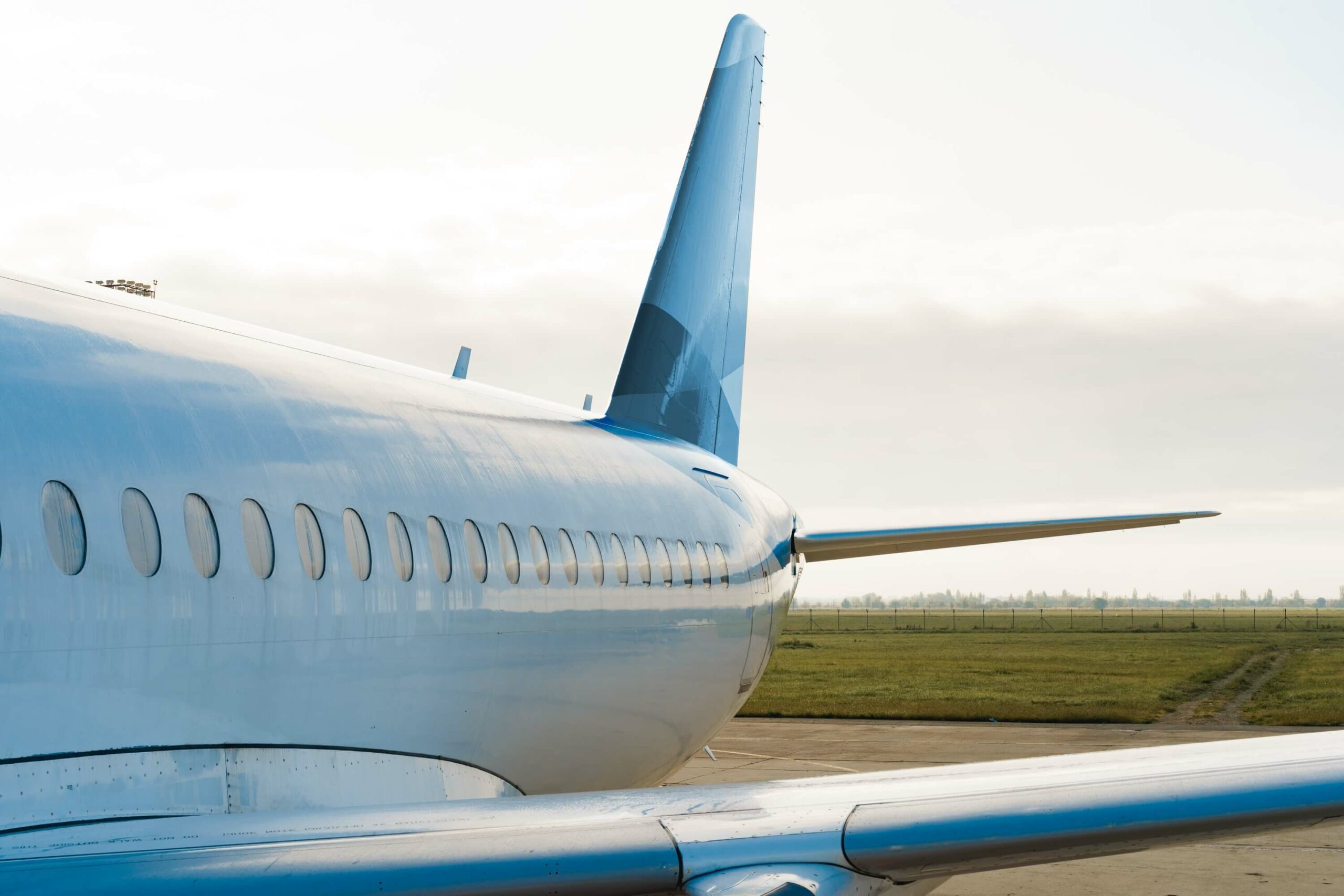 close-up-of-passenger-airplane-on-the-airport-runw-2021-09-03-18-56-59-utc-1-scaled.jpg